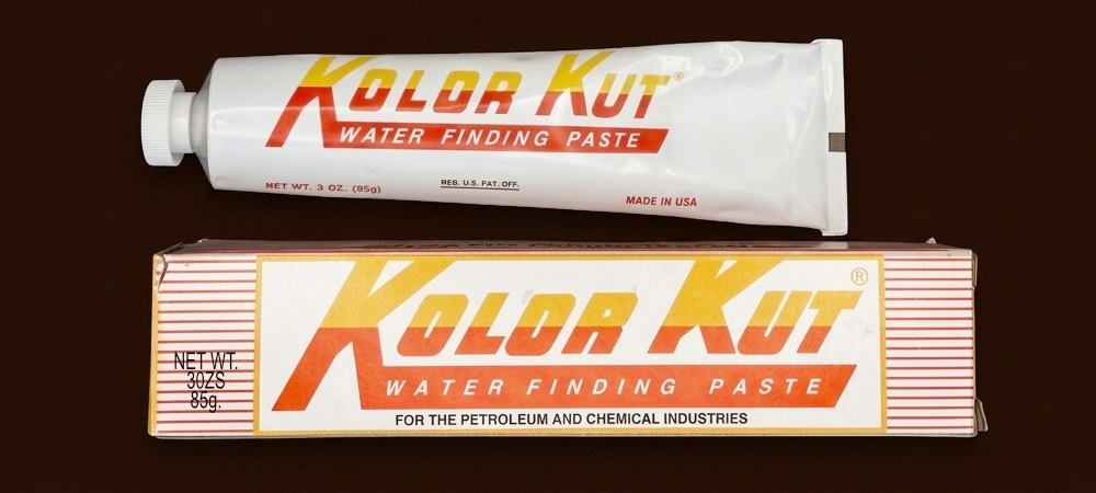 Counterfeit Kolor Kut Water Finding Paste tube next to its box, showing washed-out colour